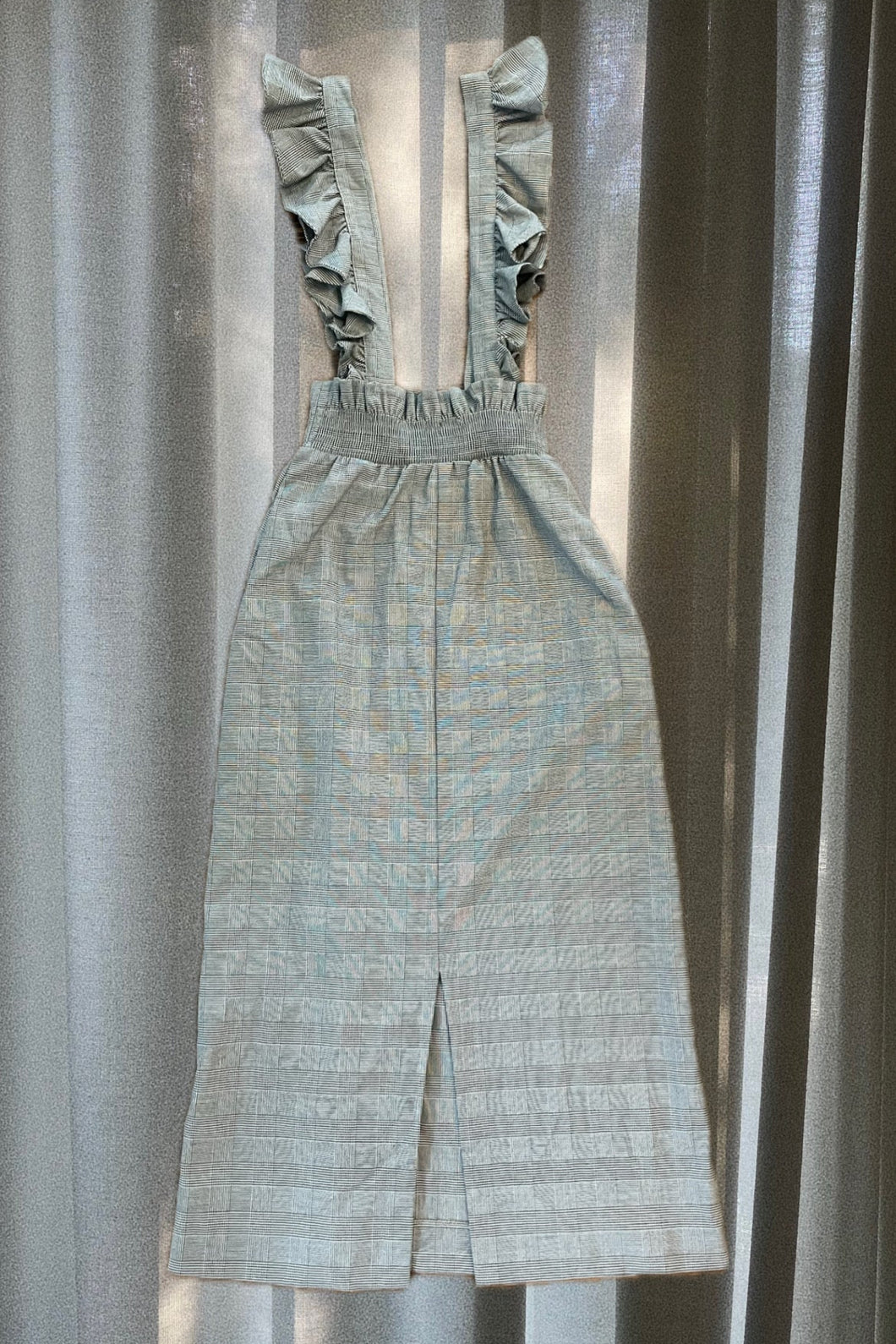 held in suspense dress